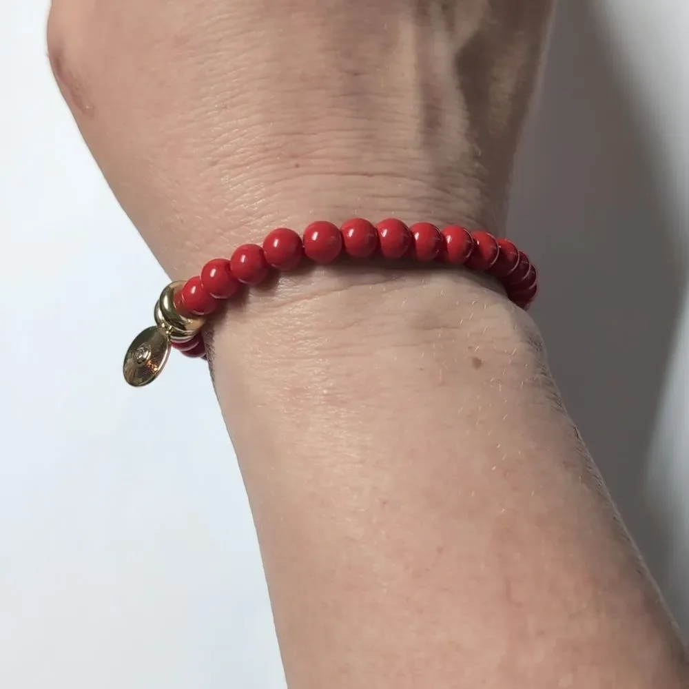 39 Red Beaded Bracelet with Gold Disc and One Rhinestone‎
